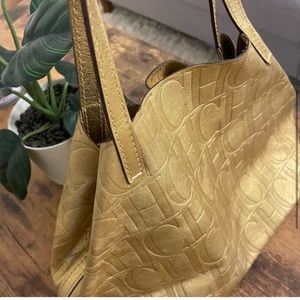 Carolina Herrera gold leather Matryoshka bag like new condition